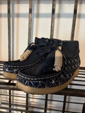 Clarks Navy Sashiko Suede Moccasin Boots with Cream Rope Detail
